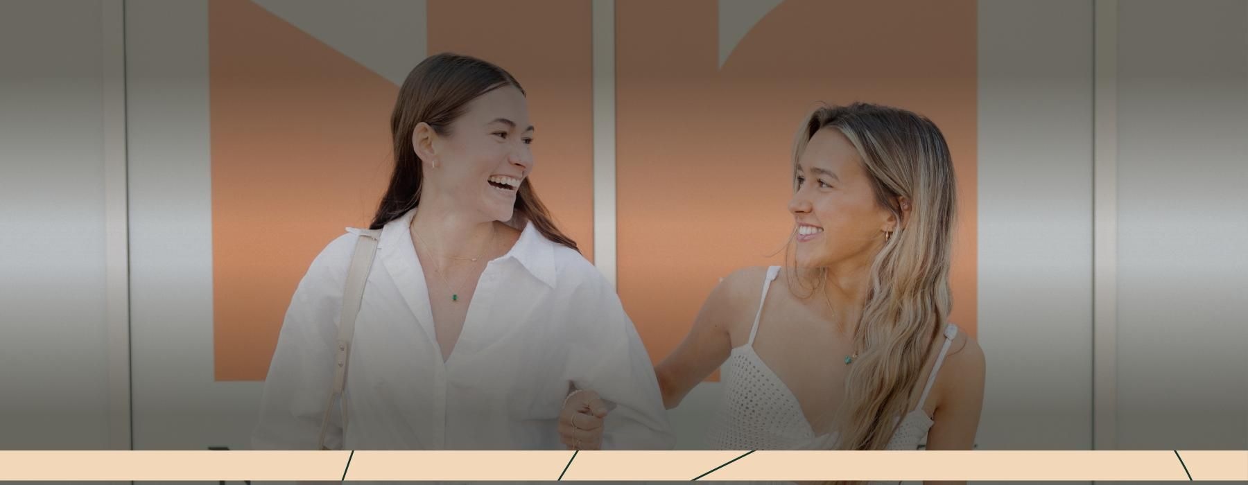 a woman and a woman smiling