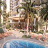 a pool surrounded by palm trees