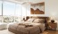 a bedroom with a large bed
